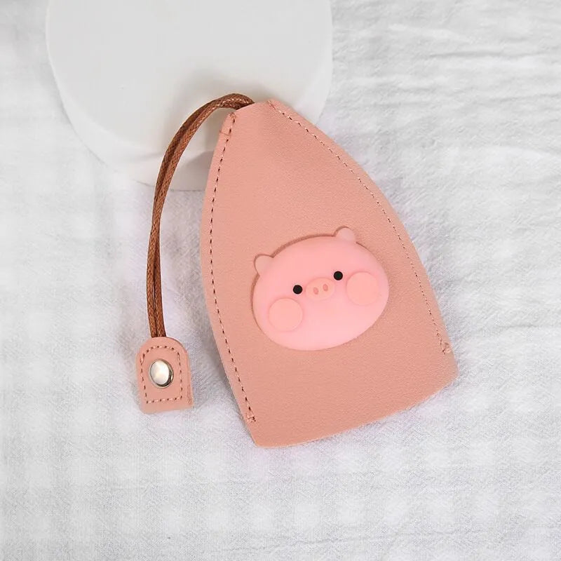 Colourful cartoon pull-out key case made from PU leather showing design options