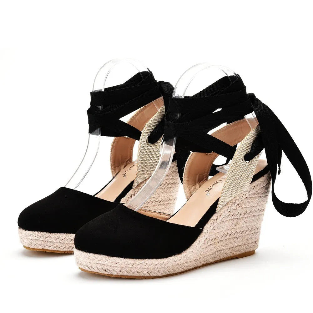 Women's bohemian wedge sandals with beading, tassels, buckle closure, and a wedge heel