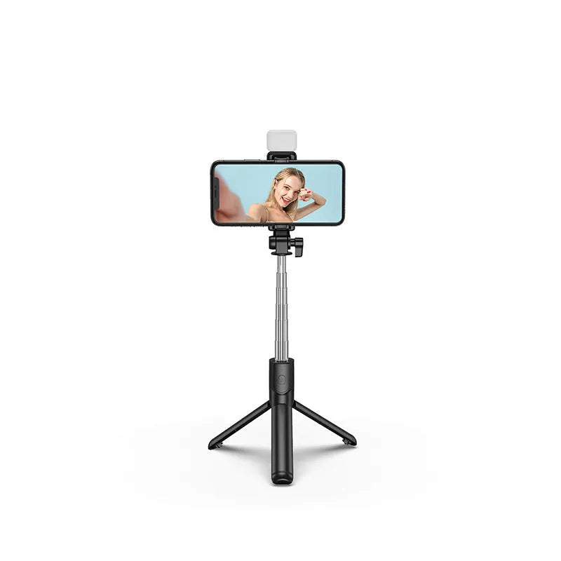 Black Bluetooth selfie stick with tripod base and phone holder, shown extended, for use with Apple iPhones.