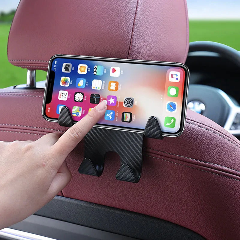 Black ABS car hook and mobile phone bracket for rear seat back storage.