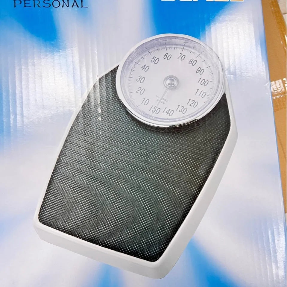 Black mechanical pointer body weight scale showing large dial on 47cm platform