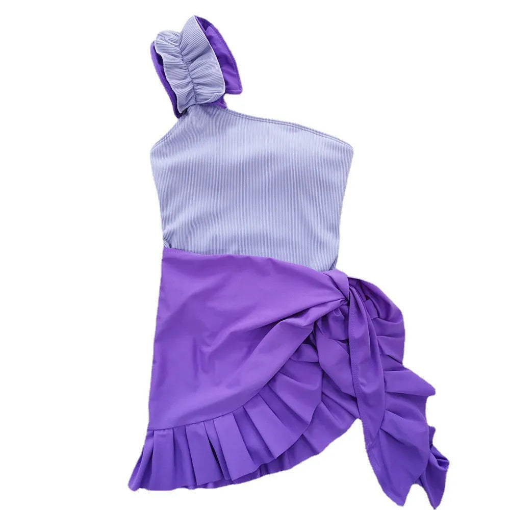 Women's single-shoulder high waist one-piece swimsuit in solid colour on a mannequin.