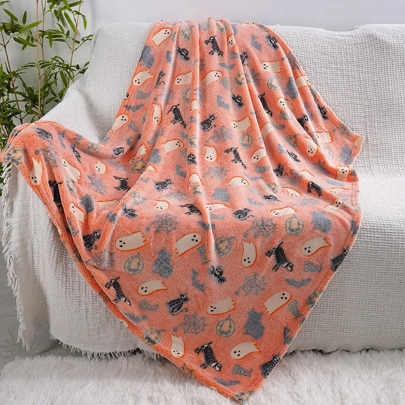Cartoon-style flannel blanket for children shown as an air conditioner cover and bed throw.