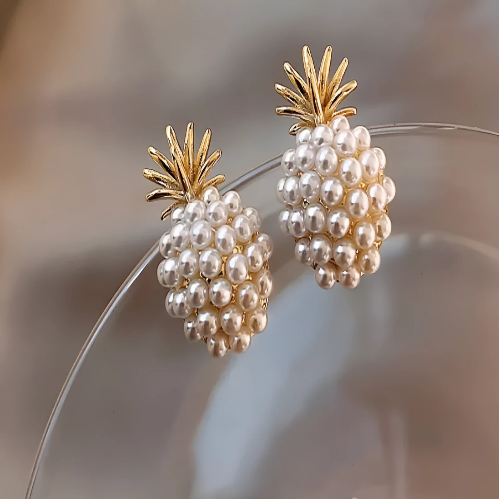 Korean style pineapple and starfish pearl earrings for women in electroplated alloy with four colour options