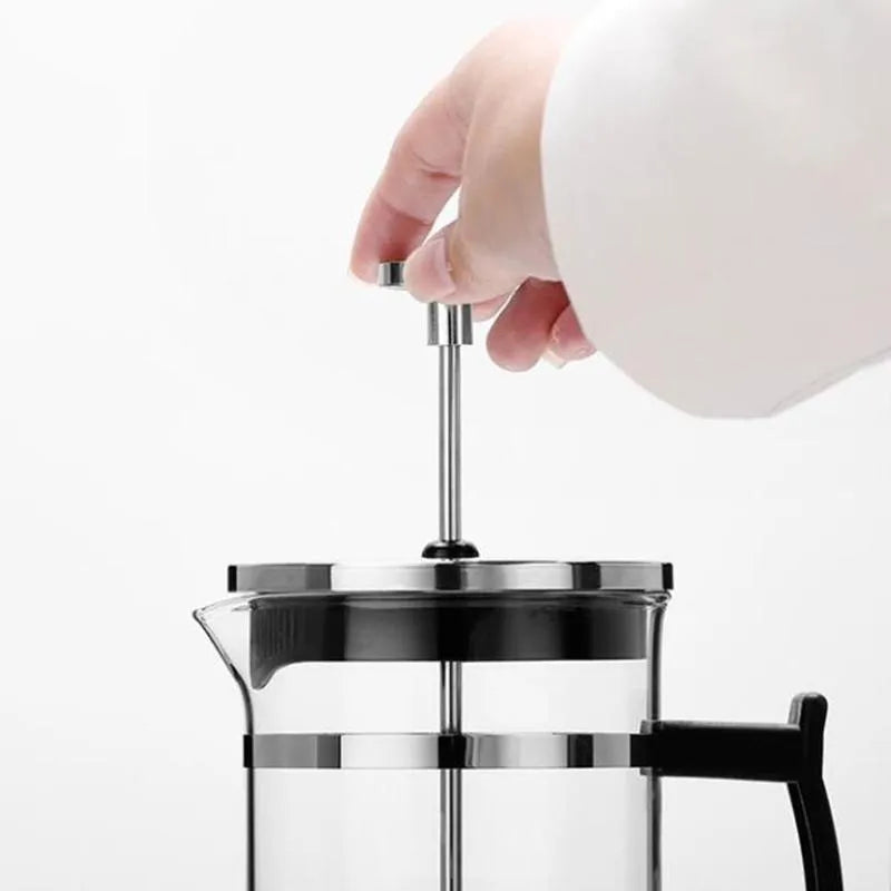 Glass and stainless steel manual coffee maker measuring 10cm wide, 8cm deep, 17cm tall with 350ml capacity.
