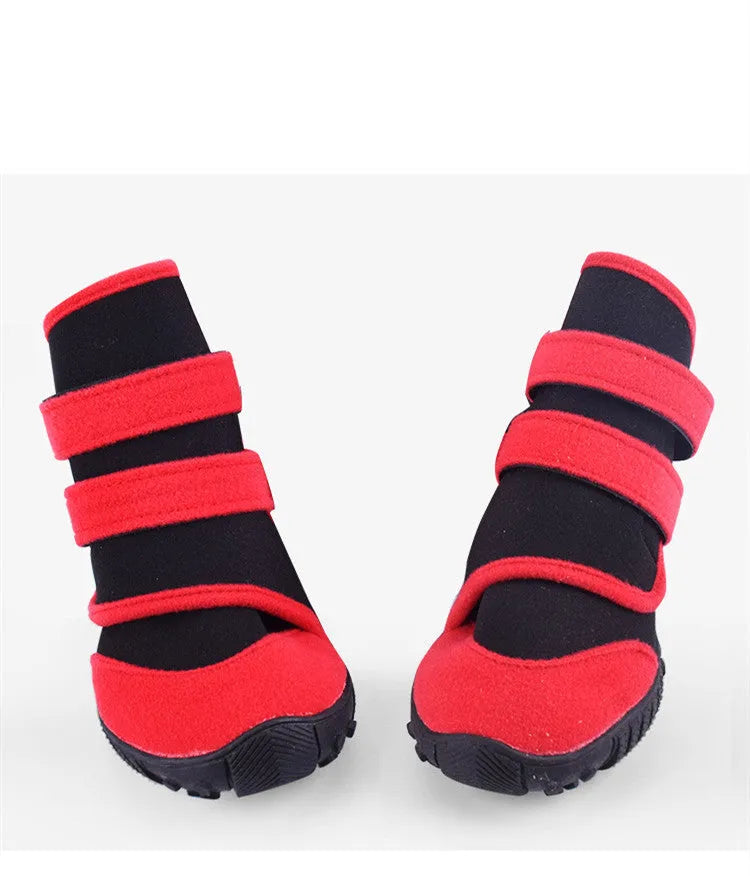Waterproof pet shoes with wet suit fabric body, beef sole and multi-toothed non-slip tread in red or blue