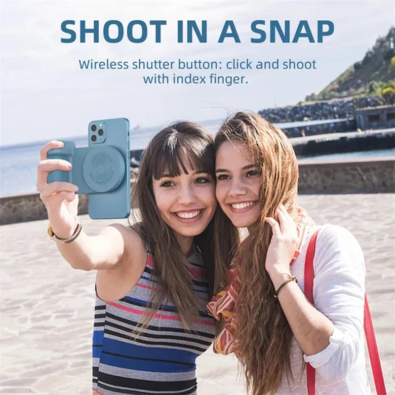 Black magnetic phone camera bracket with PU leather grip and adjustable tilt stand on a table