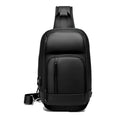 Black PVC outdoor shoulder bag with air cushion strap showing internal computer pocket and organisational compartments