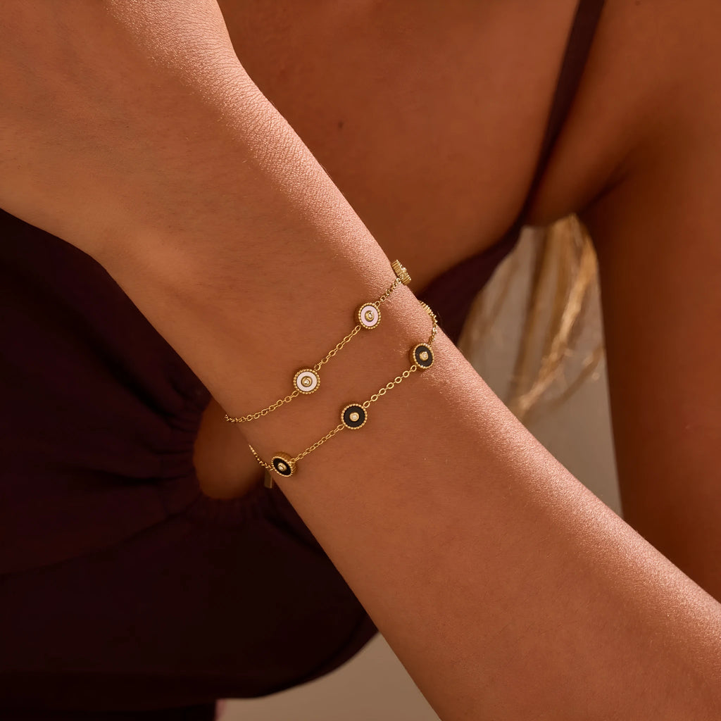 Geometric design women's jewellery set with bracelet and necklace in gold-plated stainless steel