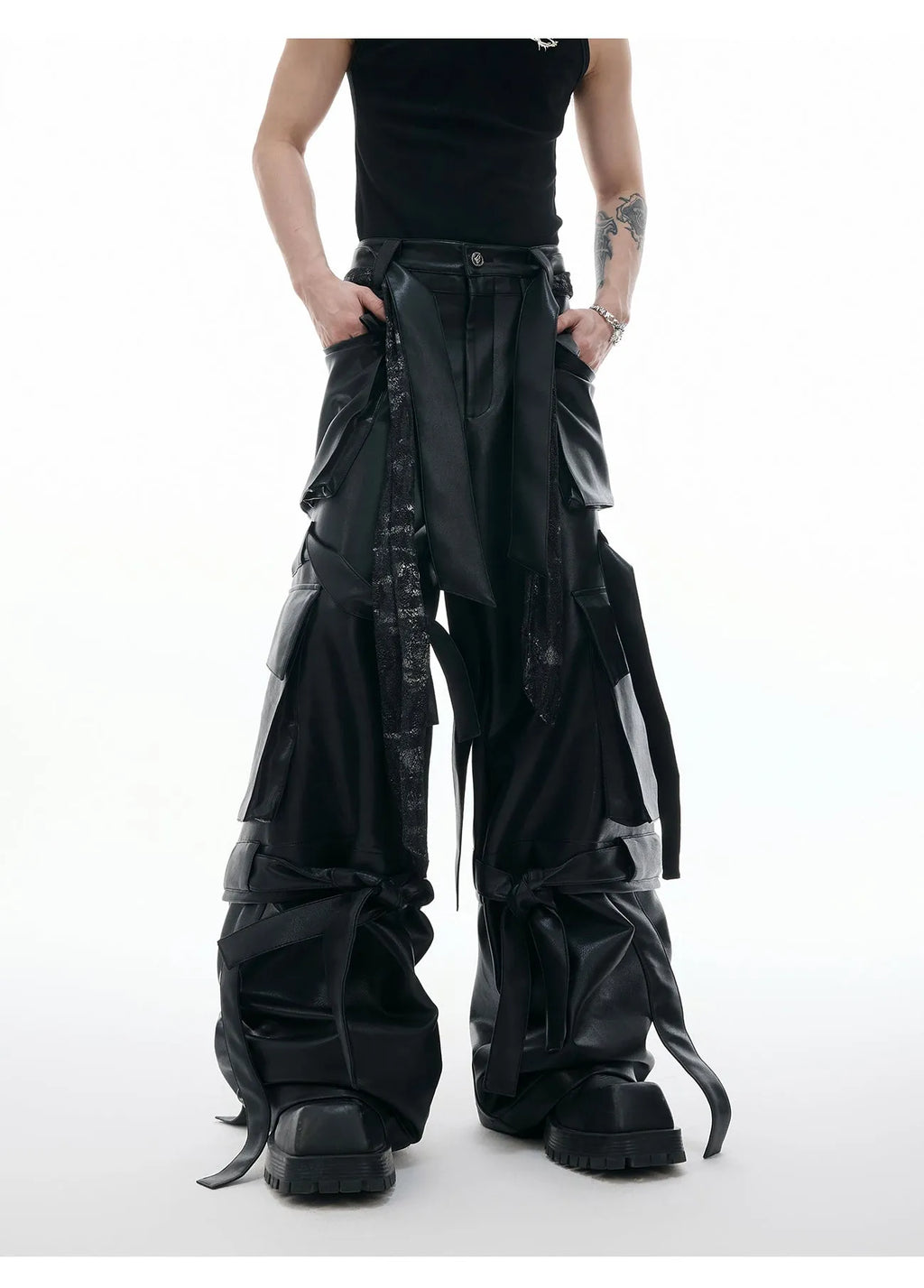 Men's black loose-fit leather trousers with quilted stitching and multiple pockets