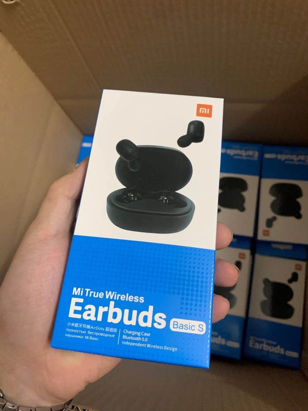 Redmi AirDots 2 black true wireless earbuds with charging case on a white background.