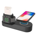 Black and white 3-in-1 wireless charging station with detachable Apple Watch charger on a wooden desk