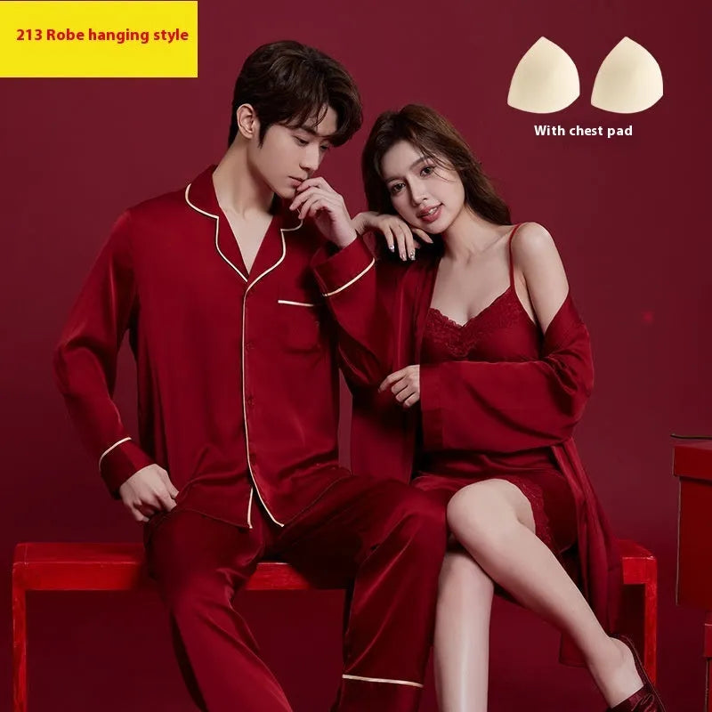 Red men's and women's long sleeve ice silk pyjama set laid flat.