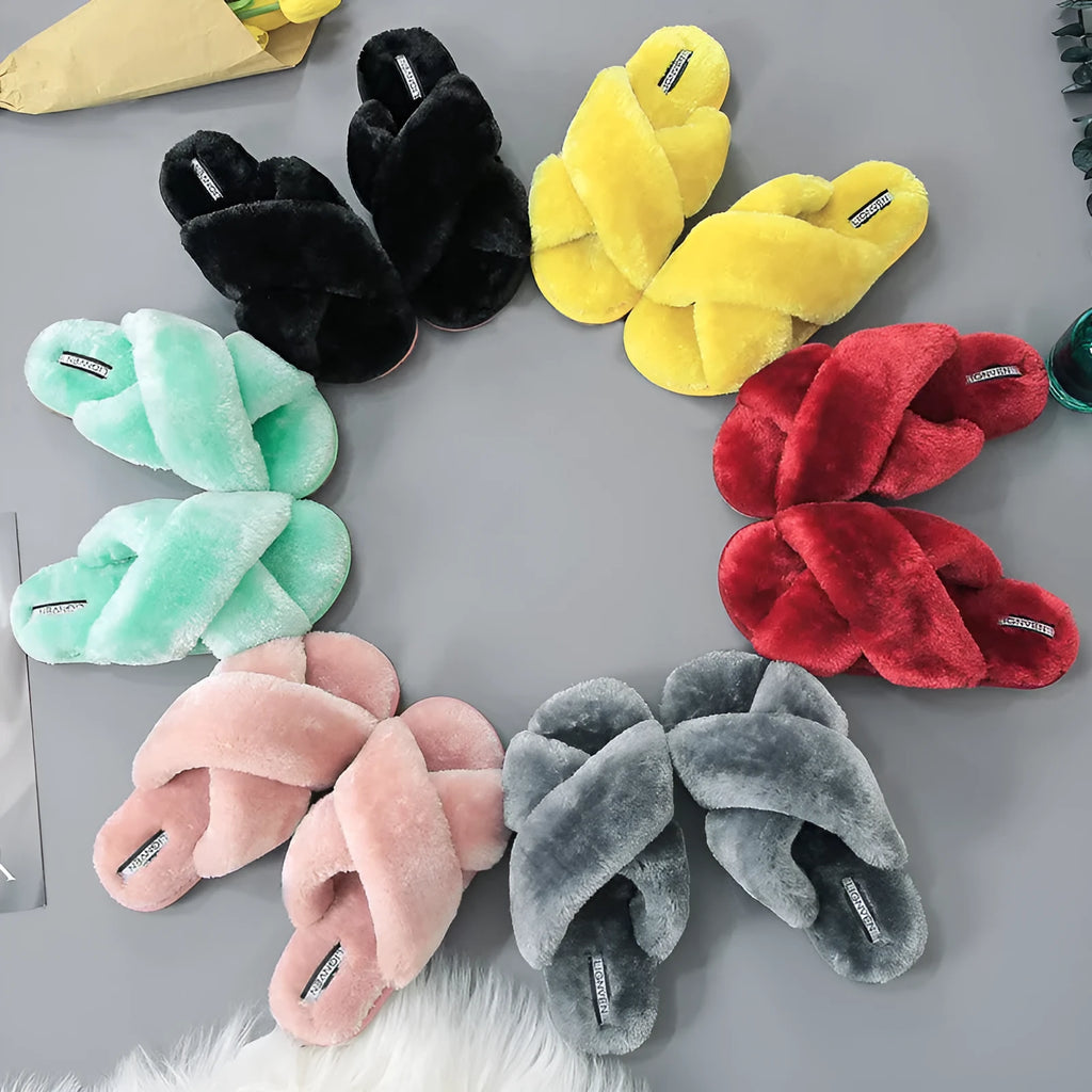 Cross open-toe fur slippers in multiple colours showing patterned sole and anatomical heel.