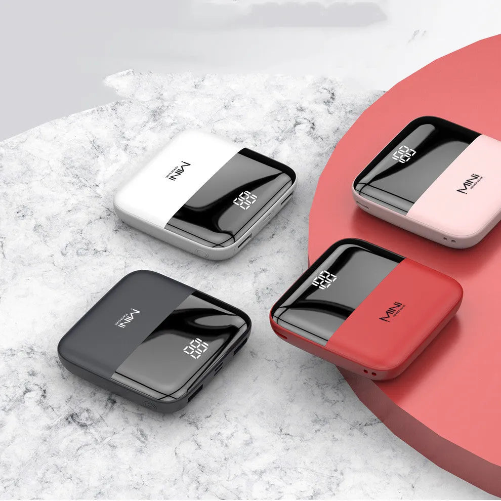 10000mAh Android portable power bank with digital display and dual USB ports in plastic casing