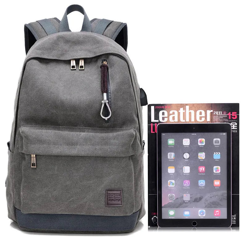 Canvas backpack with USB charging port and shoulder straps in khaki colour.