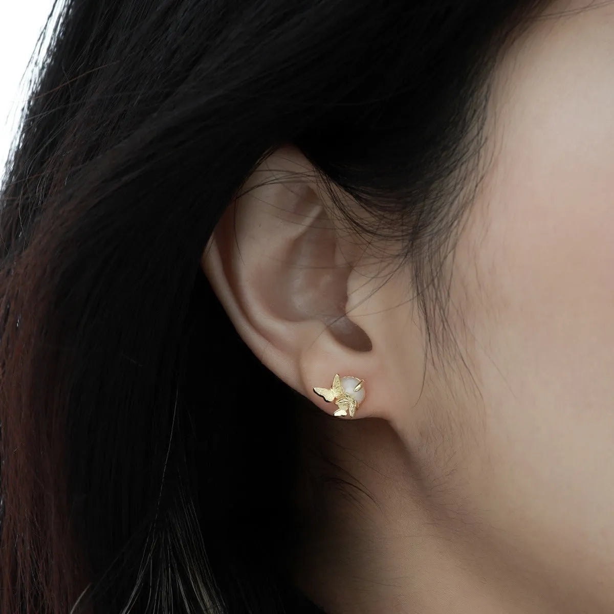 Butterfly ear studs in 925 sterling silver with electroplated white gold or gold colour finish