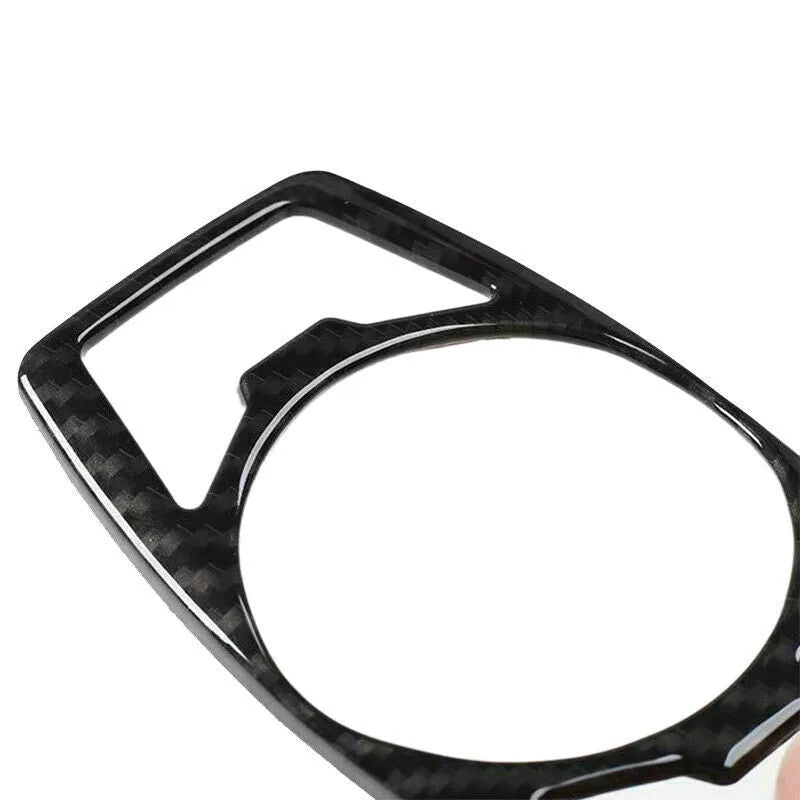 Carbon fibre decorative patch for Ford F150 Raptor headlight control housing on dashboard
