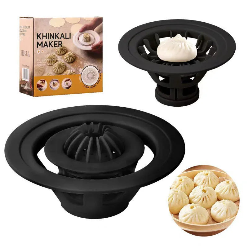 Set of four black ABS plastic steamed bun moulds with ergonomic handles for shaping baozi, dumplings and shaomai