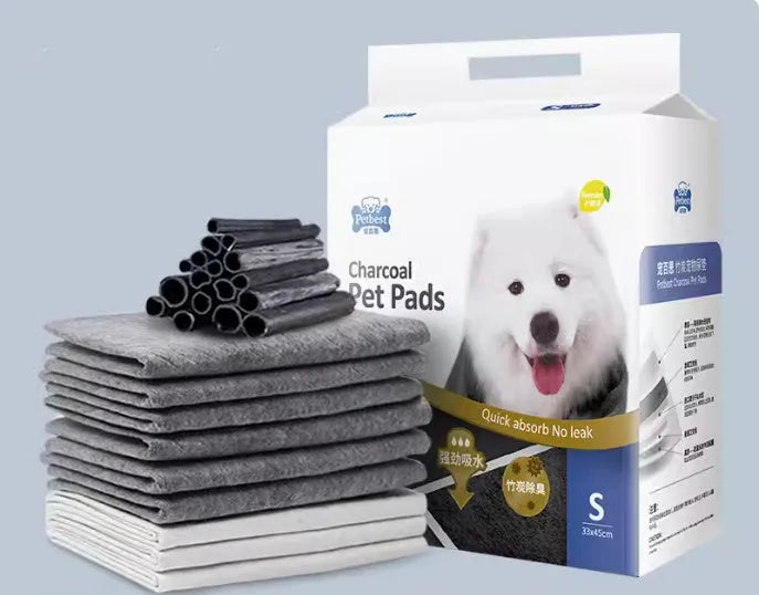Pack of thickened disposable dog urine pads showing adhesive backing and size options