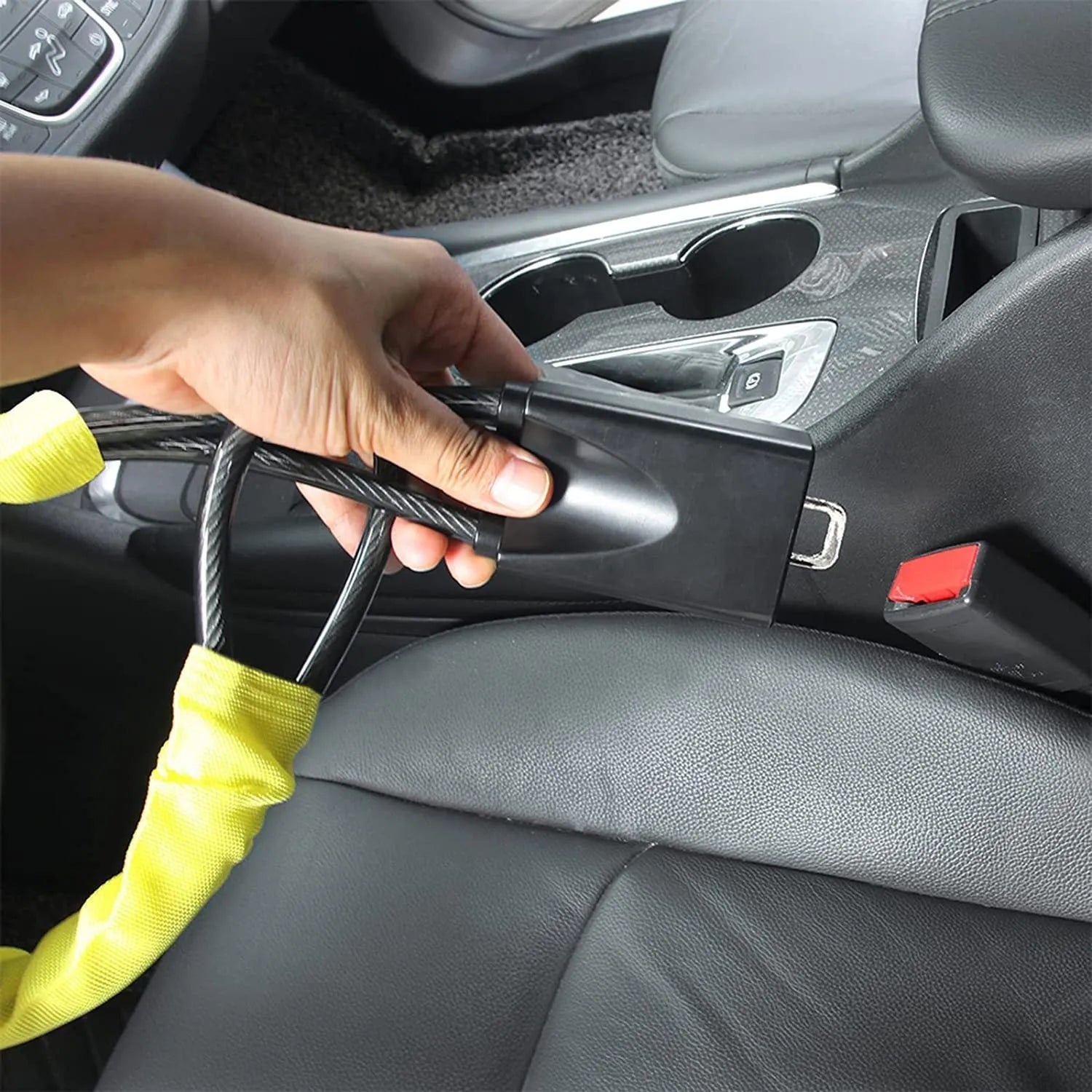 General Motors car steering wheel lock in red with iron construction and copper lock core measuring 33cm