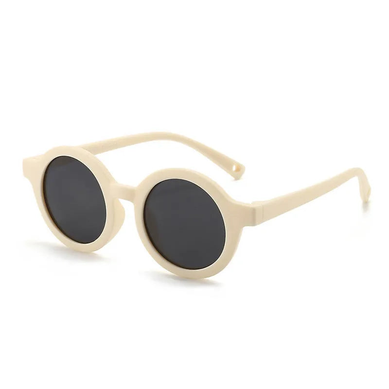 Soft silicone round-frame sunglasses for babies and toddlers aged 0-3 years with polarised UV400 lenses.