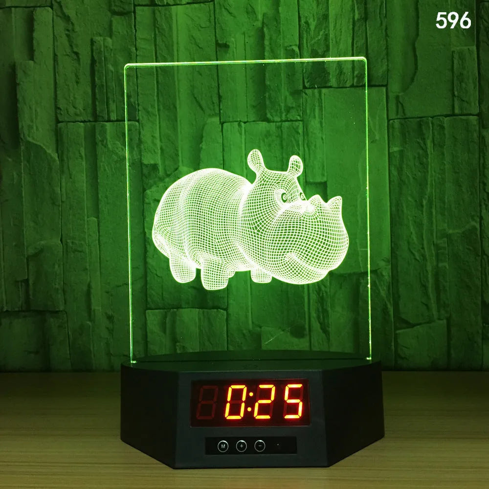 3D blue dolphin LED table night light with remote control on wooden surface