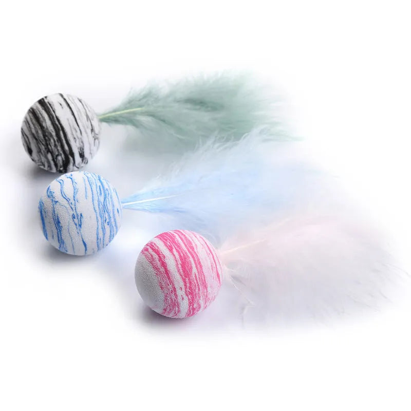 Rainbow EVA foam and feather cat toy ball for grabbing, training and chewing, in Black, Blue or Pink.