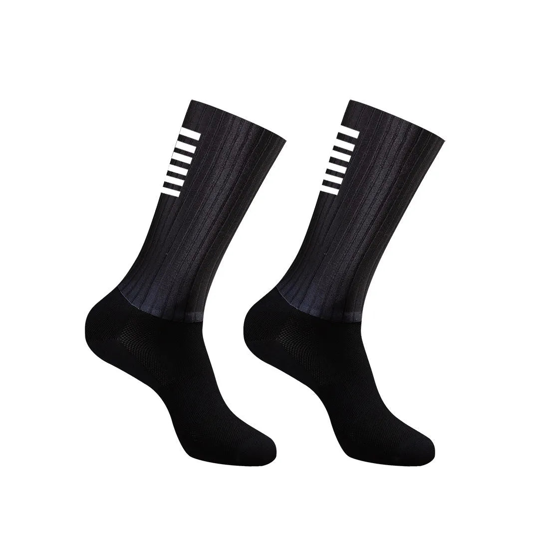 Athletic sports socks for cycling and running in six colour options including orange, black, and purple.