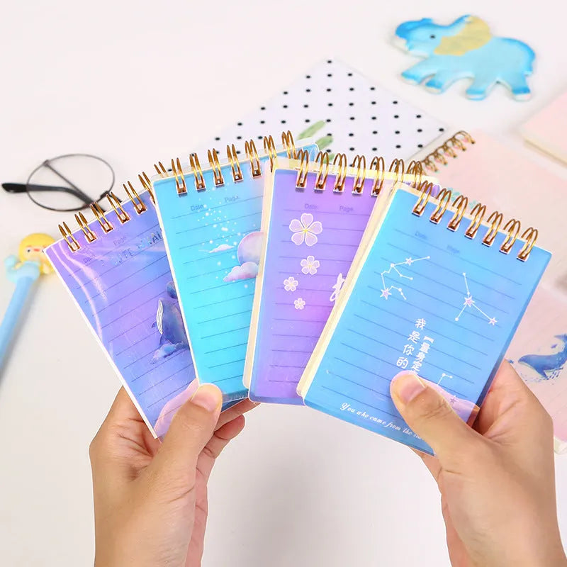 A7 spiral-bound pocket notebook with coil binding and PP plastic cover in four design colour options