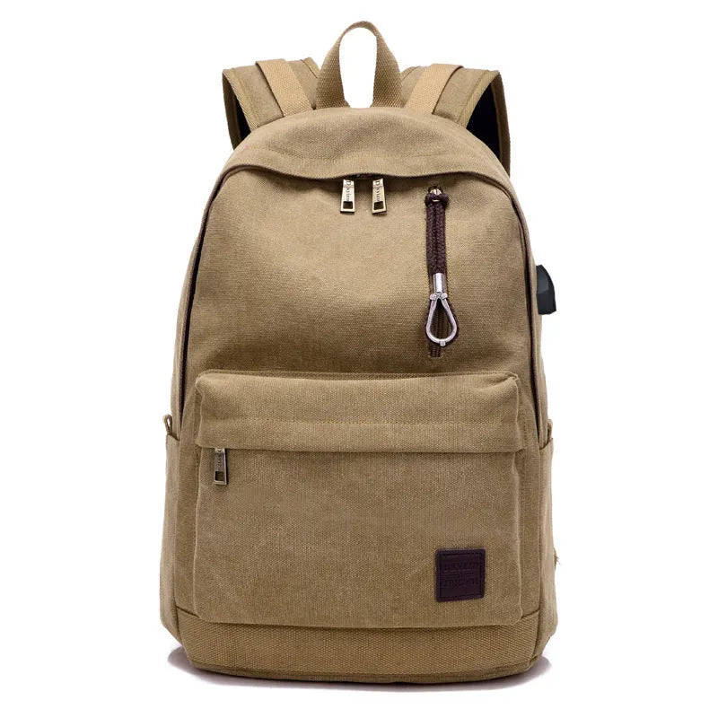 Canvas backpack with USB charging port and shoulder straps in khaki colour.