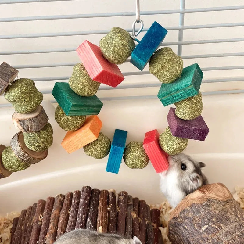 Small pet straw ball ring chew toy in coloured sequin or Applewood options