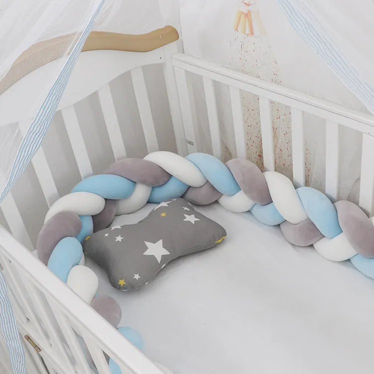Braided knot cot bumper cushion in spandex velvet for crib safety protection.