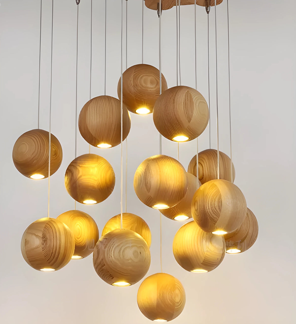 Nordic style wood ball chandelier with adjustable hanging height and solid wood construction for living room
