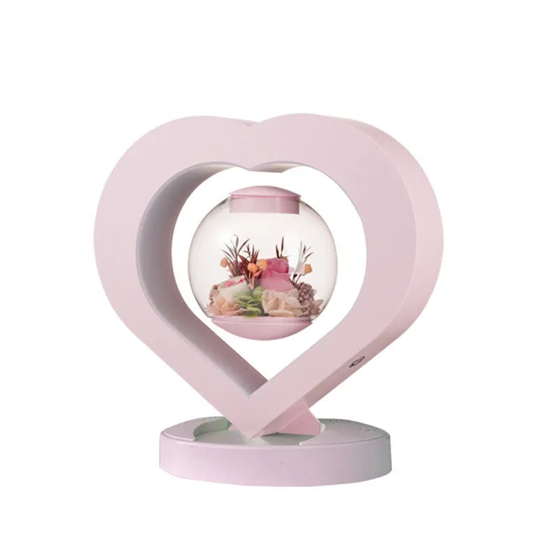 Pink preserved rose ornament in a gift box with optional bluetooth base and international plugs