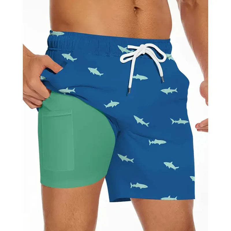 Man wearing loose grey polyester beach shorts, showing fit and style for summer leisure.