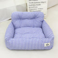 Car-mounted pet outing nest in stain-resistant cloth showing grey and blue plaid colour options