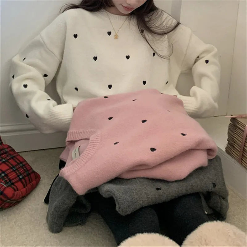 Women's loose-fitting acrylic pullover sweater with love embroidery in milky white, long sleeves, crew neck.