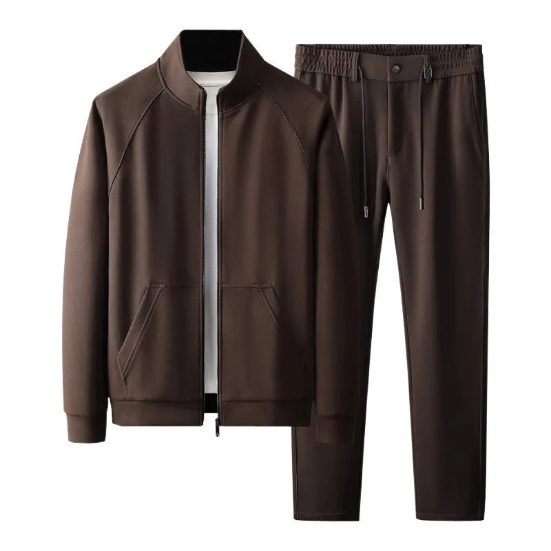 Stand collar casual sports suit comprising a coat and trousers in a slim fit, shown in coffee colour.