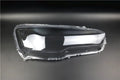Transparent plastic headlight housing cover measuring 50x30x20mm for vehicle lampshade protection