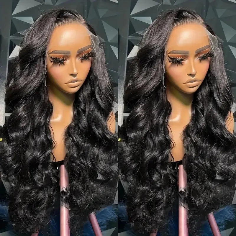 Black medium length curly synthetic wig on display stand showing lace mesh cap and wave pattern