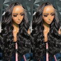 Black medium length curly synthetic wig on display stand showing lace mesh cap and wave pattern