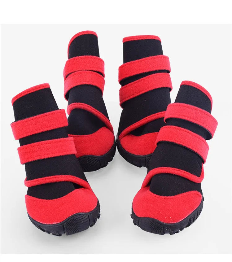 Waterproof pet shoes with wet suit fabric body, beef sole and multi-toothed non-slip tread in red or blue