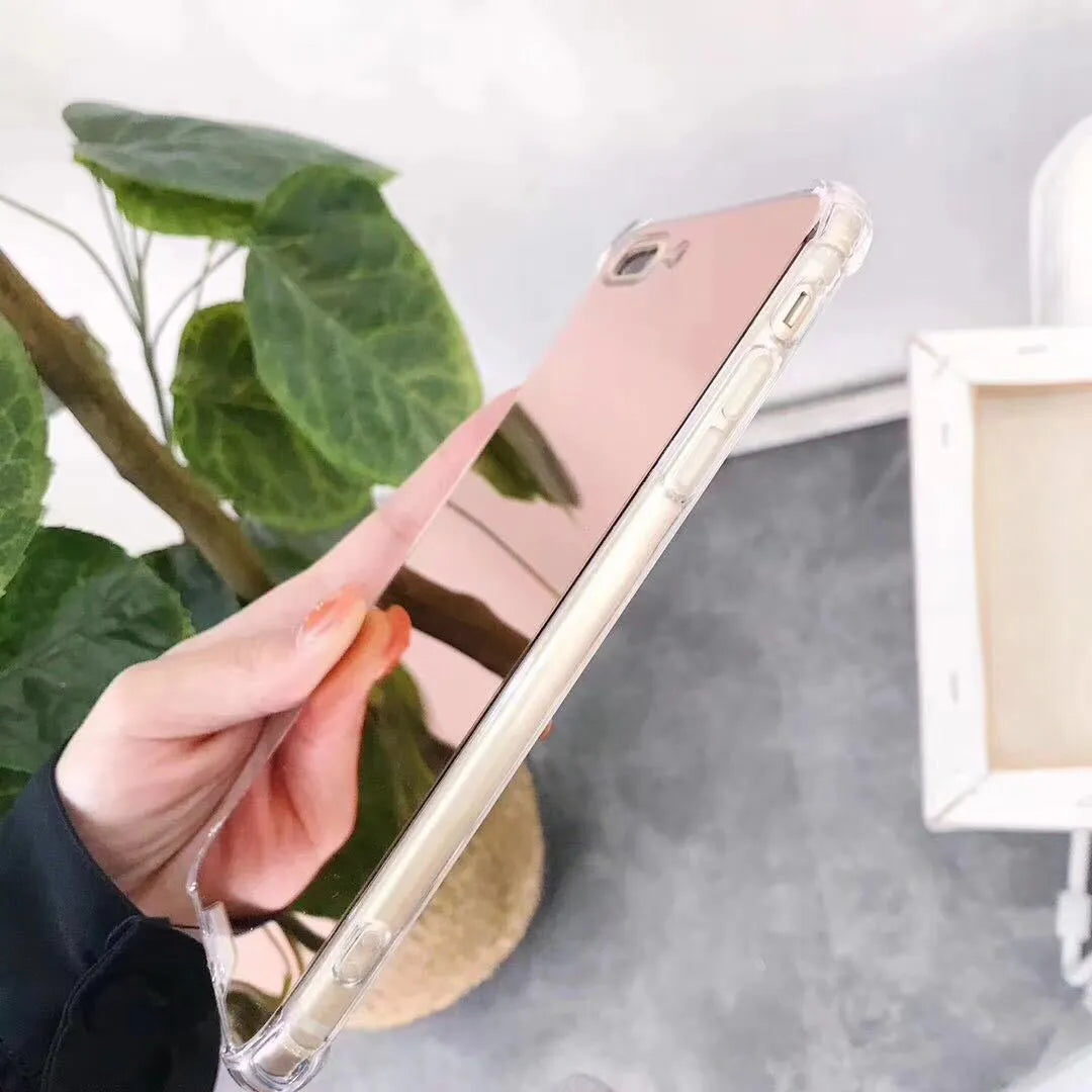 Soft TPU Mirror Phone Case for iPhone in multiple colours on a table.