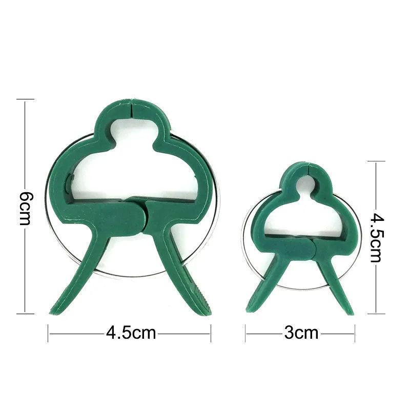 Green plastic and zinc plant fixing clips: 10 large and 10 small for climbing plants.
