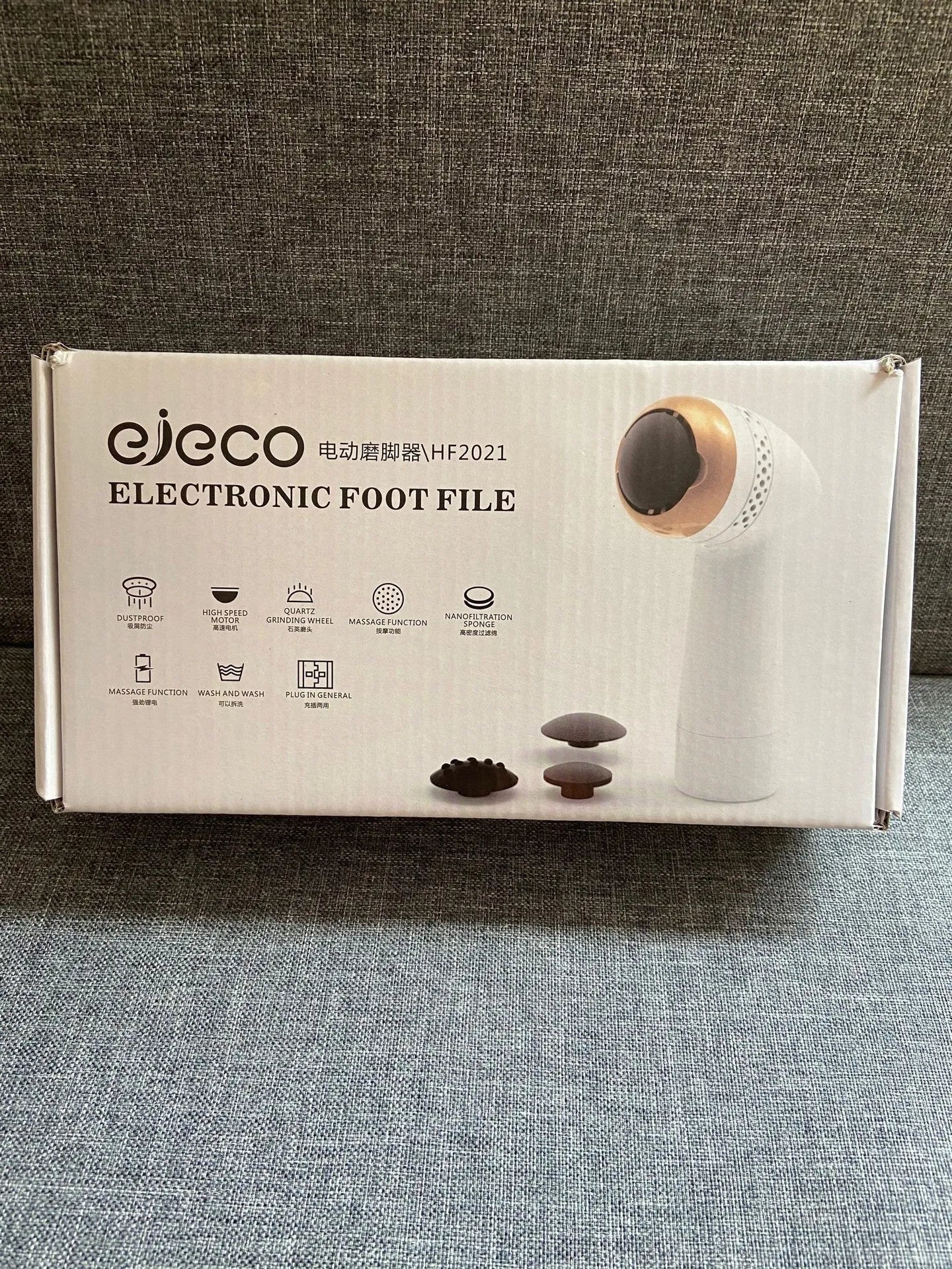 Electric vacuum foot grinder with quartz head in gold colour, showing battery and callus removal function.
