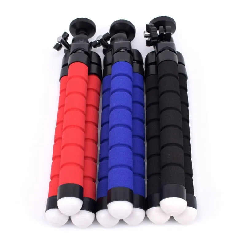 Black flexible octopus tripod with wrapped legs holding smartphone for angled photography