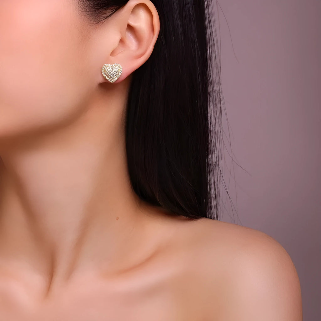 S925 silver moissanite heart stud earrings with gold finish, simple design