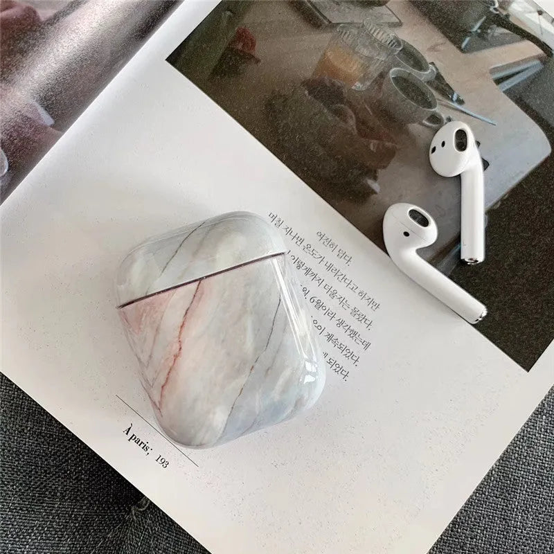White marble hard PC protective case covering Apple AirPods wireless earphone charging box