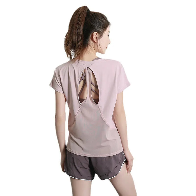 Women's short sleeve polyester sports t-shirt in sky blue, shown on a model.